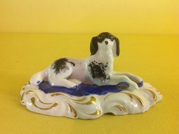 A Staffordshire porcelain model of a King Charles spaniel 