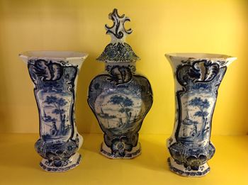 A garniture of three Dutch Delft vases