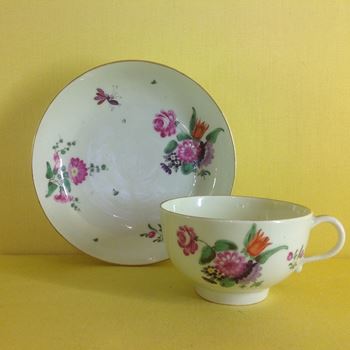 A Worcester tea cup and saucer