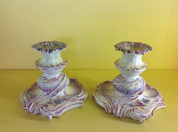 An extremely rare pair of Bow low candlesticks 