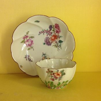 A Chelsea tea bowl and saucer 