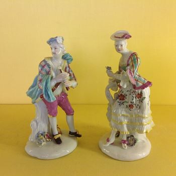 A rare pair of Derby figures of a Scottish shepherd and shepherdess