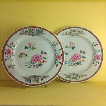 An unusual pair of Chinese famille rose plates 