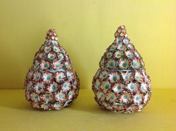 A rare pair of Derby pineapple shaped boxes and covers 