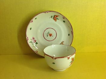 A Bristol tea bowl and saucer