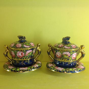 A fine pair of Spode 'Image Handled' chocolate cups, covers and stands 