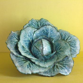 An Anne Gordon (Marchioness of Aberdeen) faience model of a cabbage 