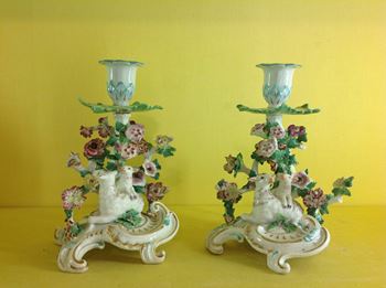 A rare pair of Chelsea chamber candlesticks 