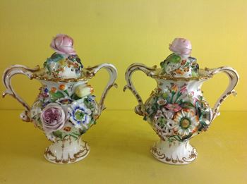 A pair of Coalbrookdale pot pourri vases and covers 