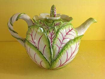 An unusual Anne Gordon porcelain teapot and cover 