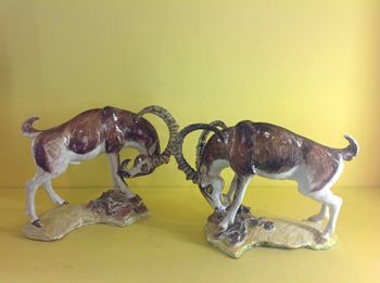 An unusual pair of Anne Gordon faience models of antelopes 