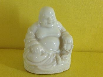 A Chinese blanc de chine small figure of Putai 