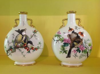 A pair of Staffordshire porcelain moon flask shaped vases