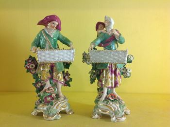 A pair of Chelsea sweetmeat figures 