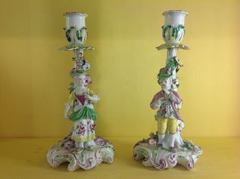 A pair of Derby 'Pale Family' candlesticks 