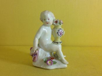 A very rare Derby small figure of a child 
