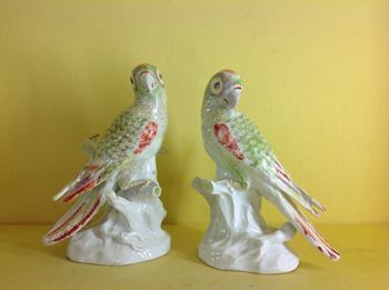 A very rare pair of Derby models of parakeets 