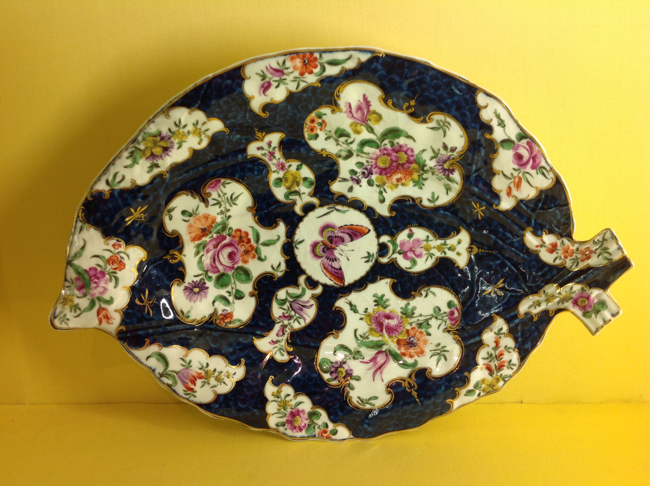 A Worcester cabbage leaf shaped dish