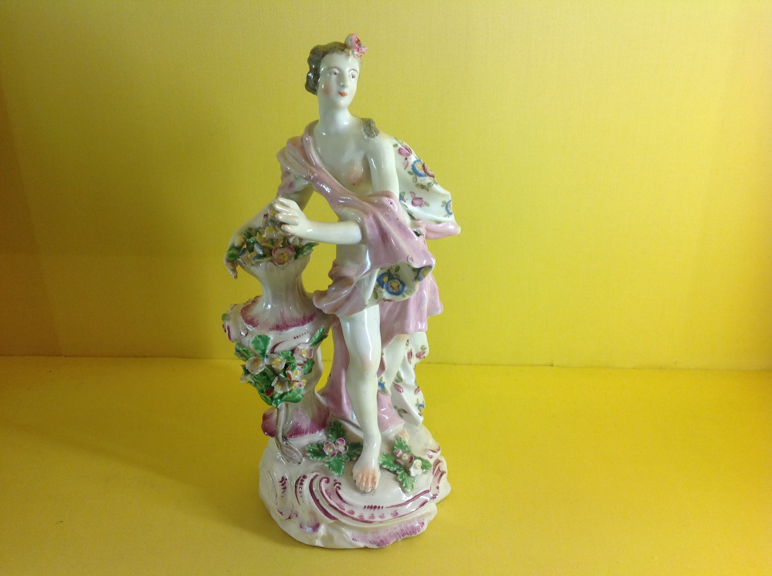 A Bow figure of Flora