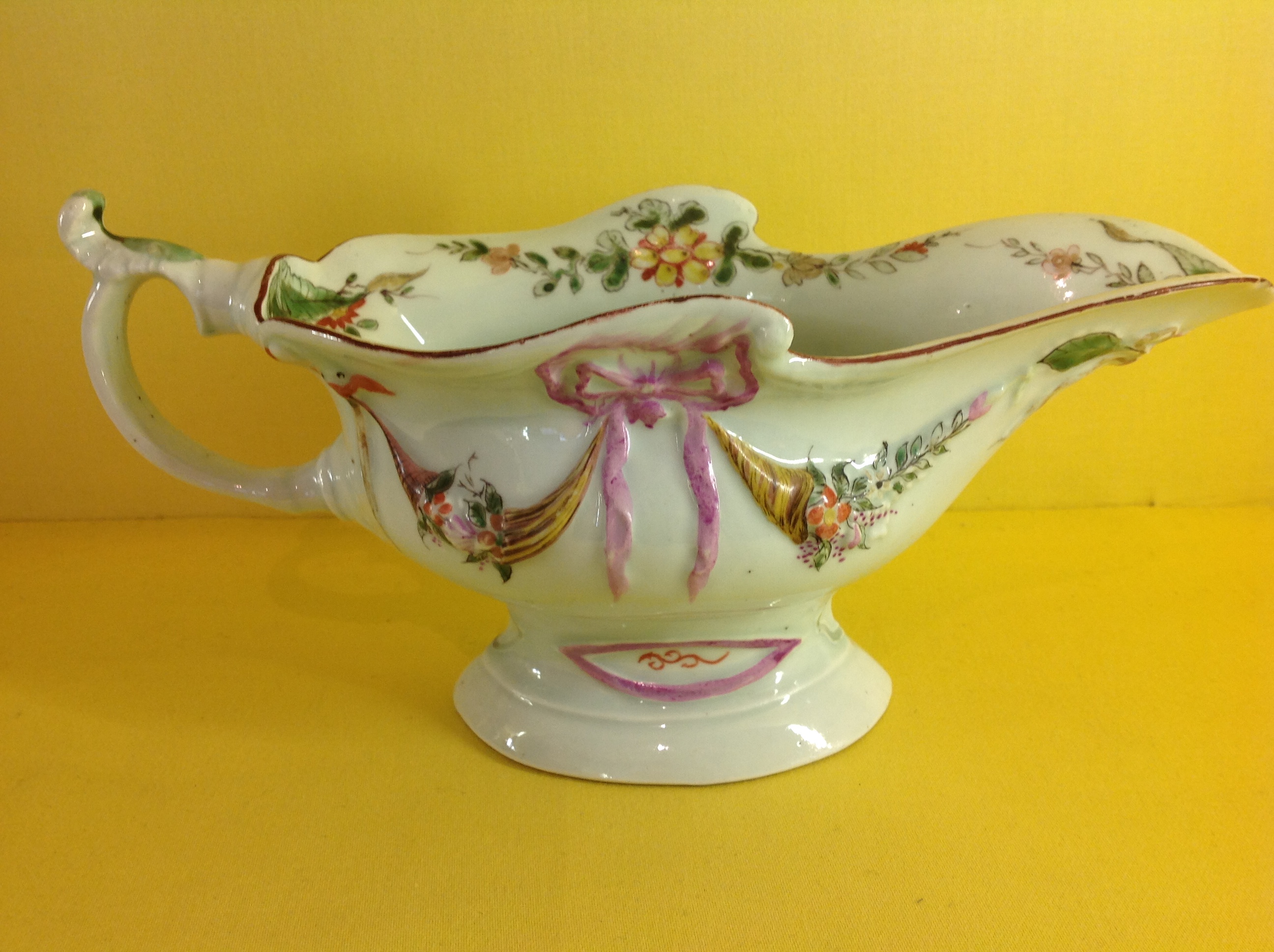 A rare early Worcester sauceboat 