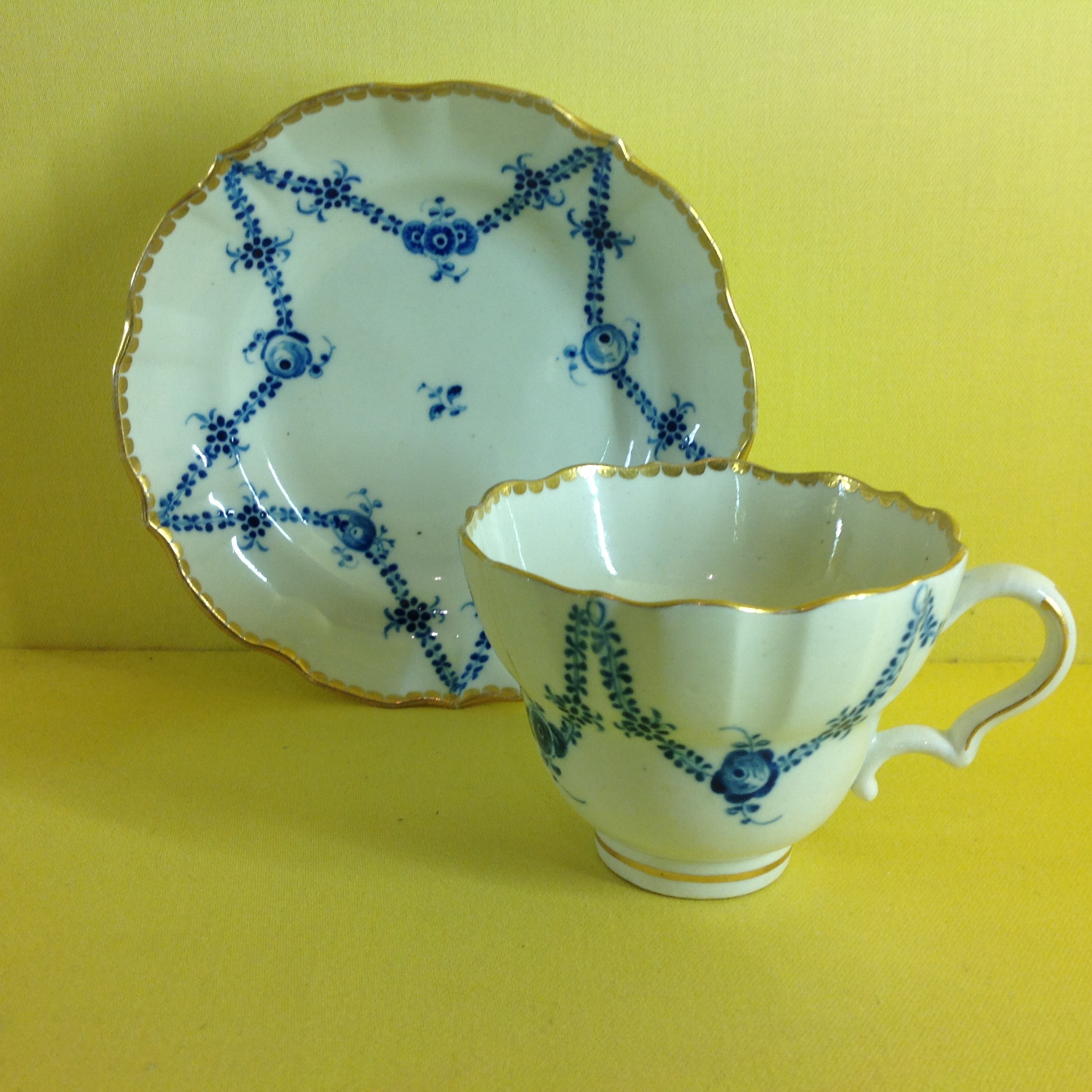 A Caughley tea cup and saucer