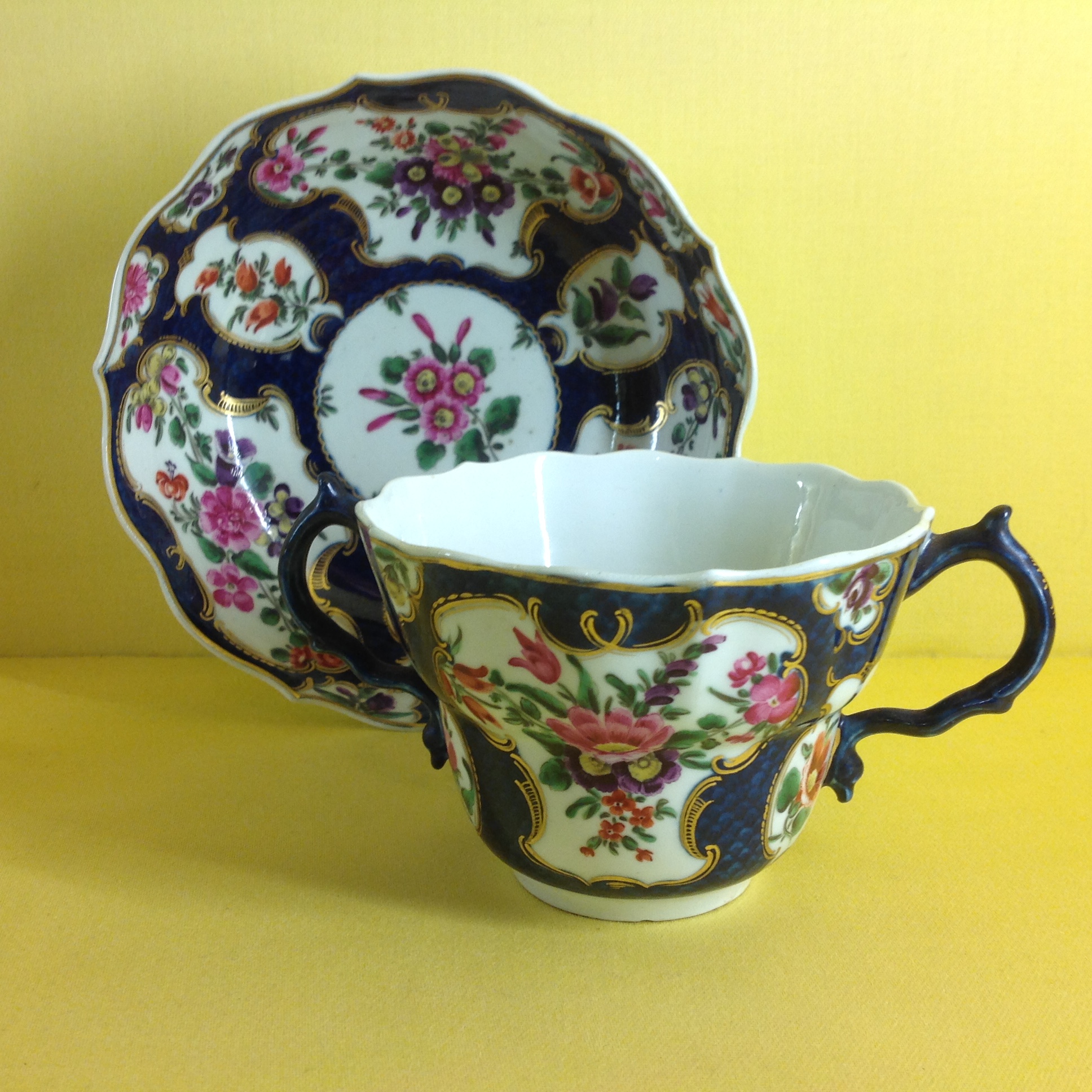 A Worcester chocolate cup and saucer
