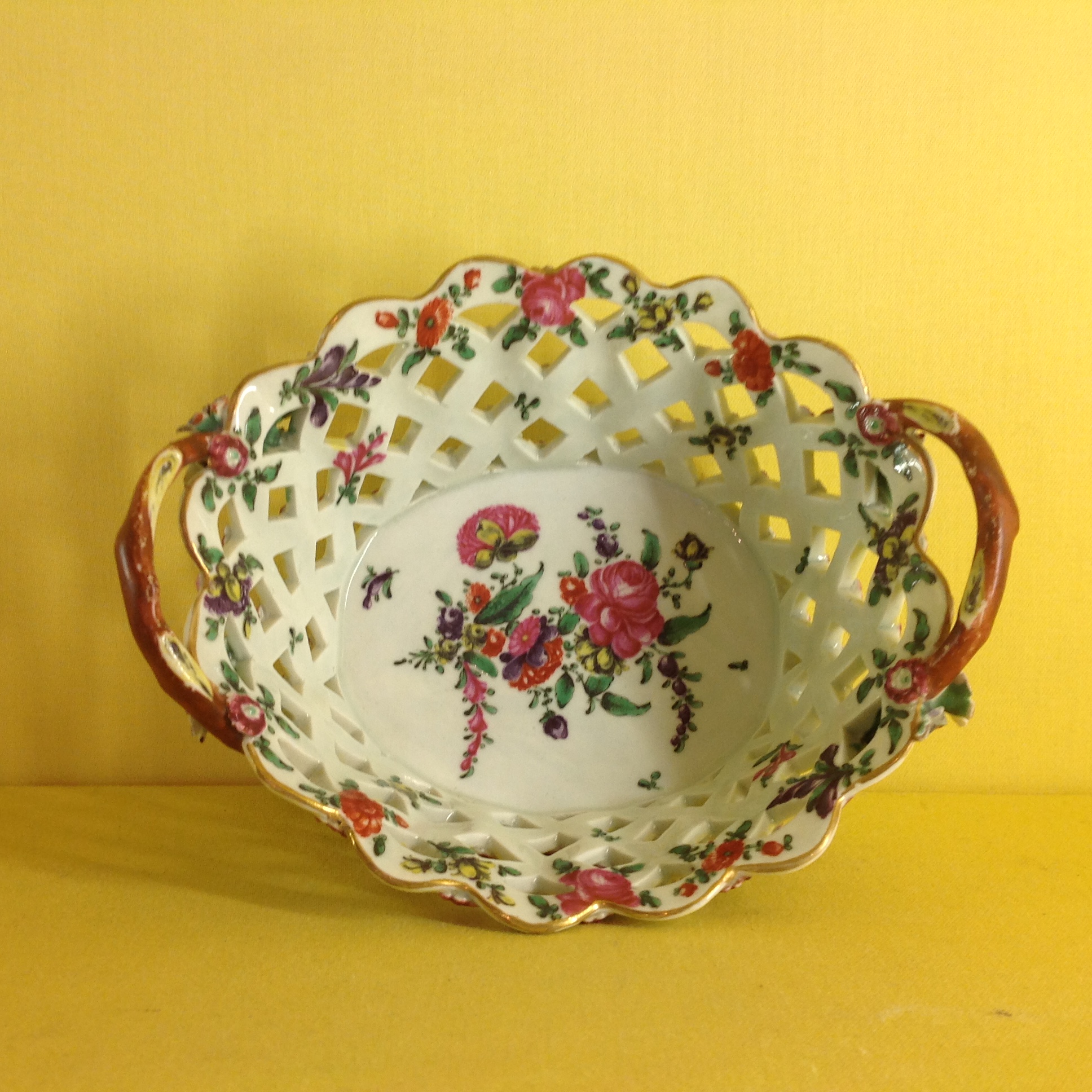 A Worcester yellow ground basket
