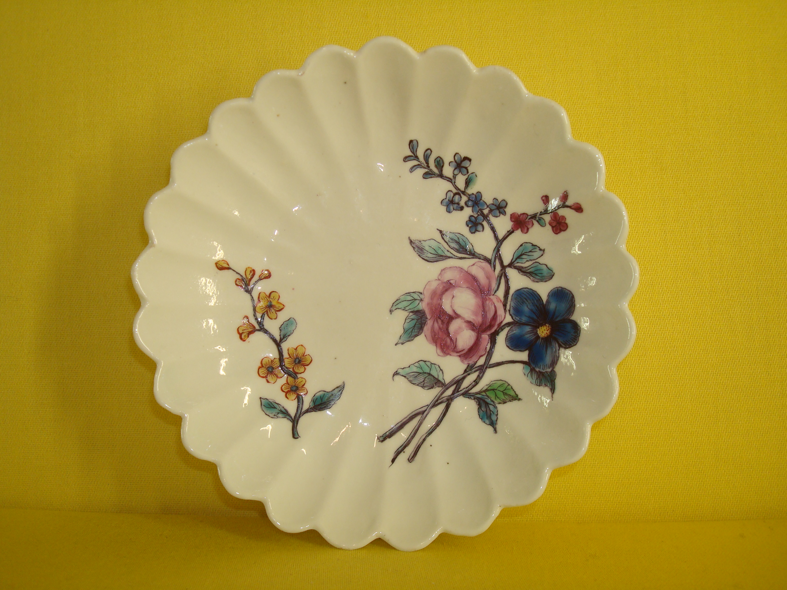 A Chelsea fluted saucer