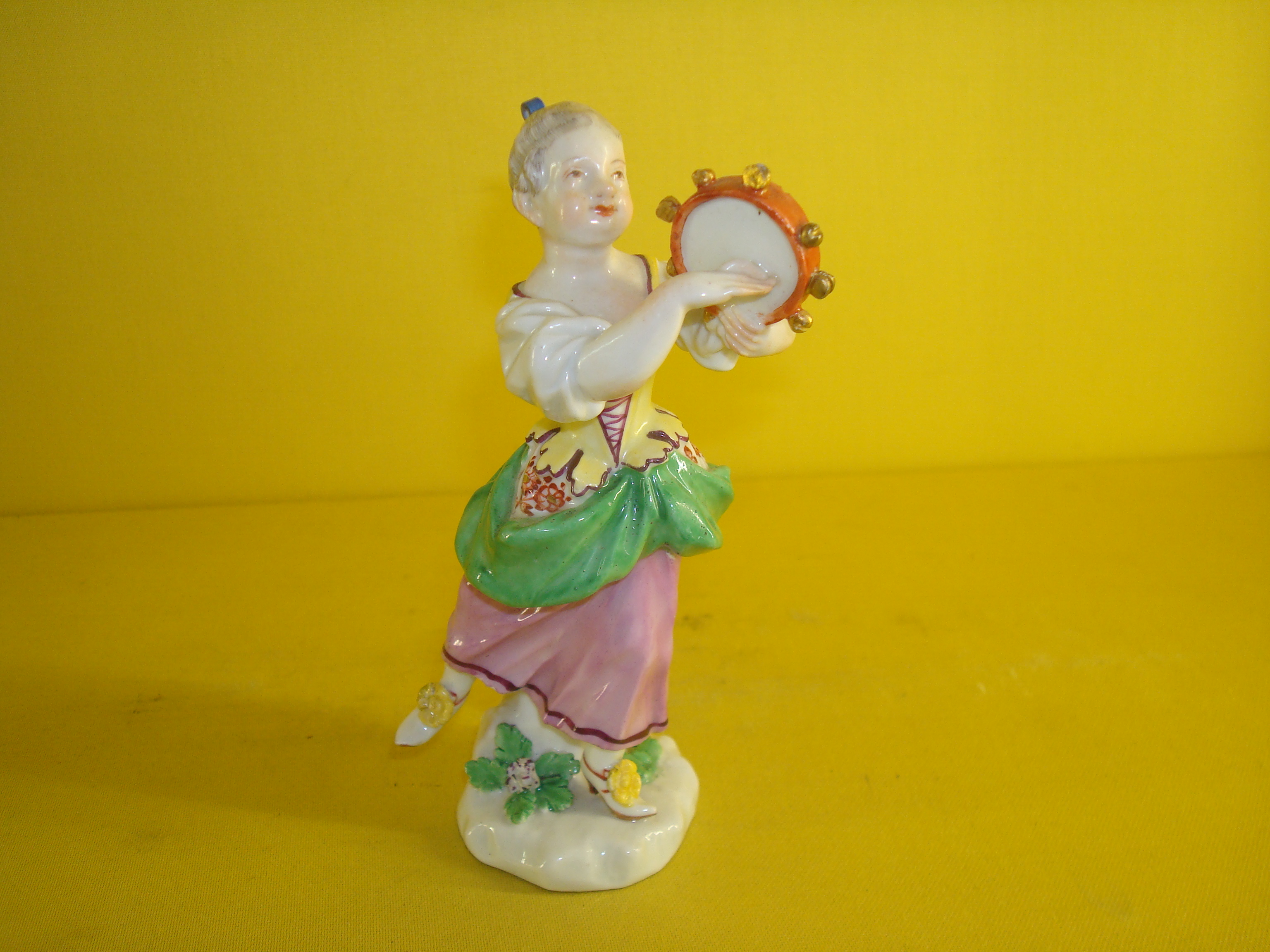 A Meissen figure of a young girl