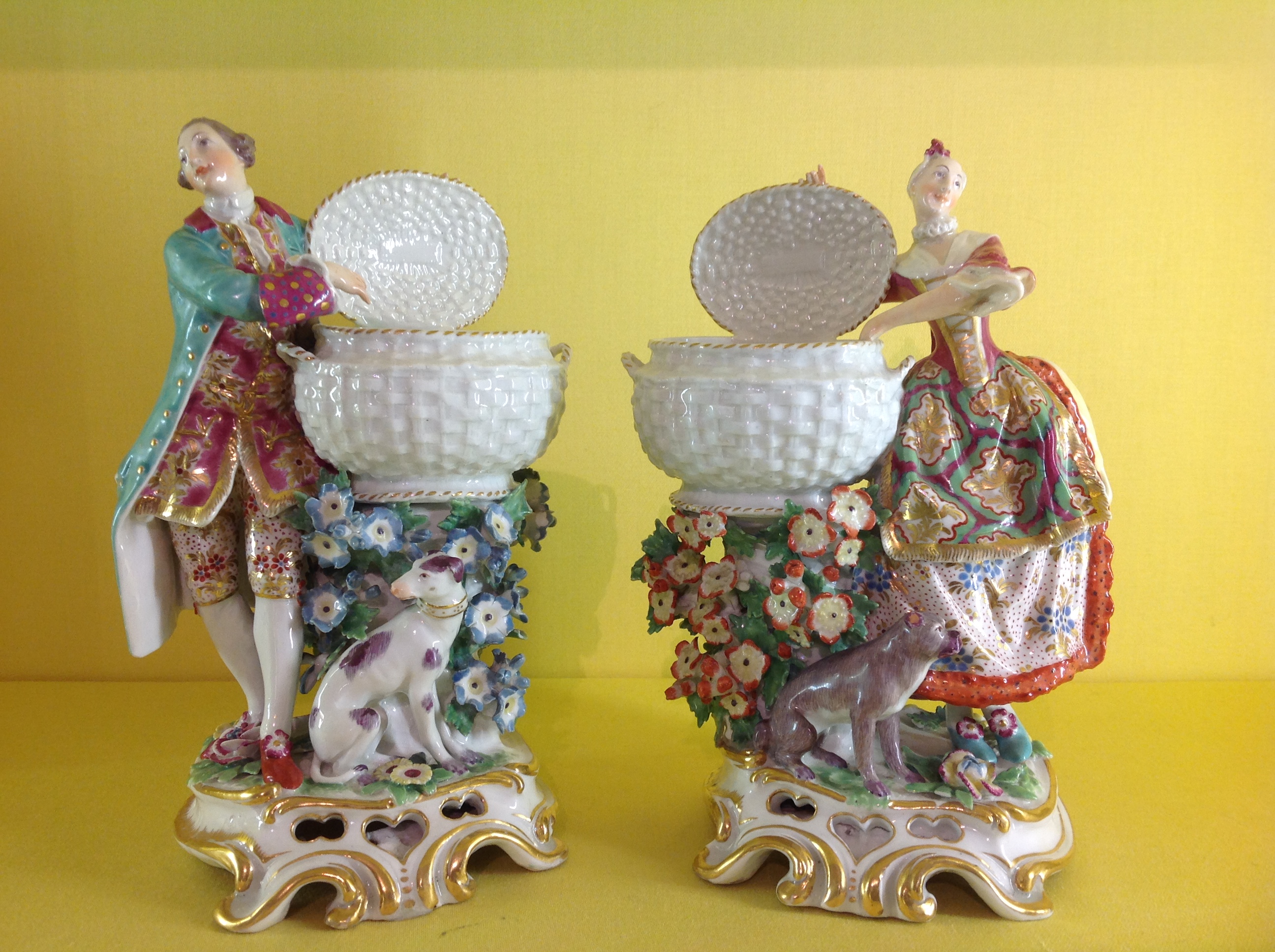 A pair of Chelsea sweetmeat figures