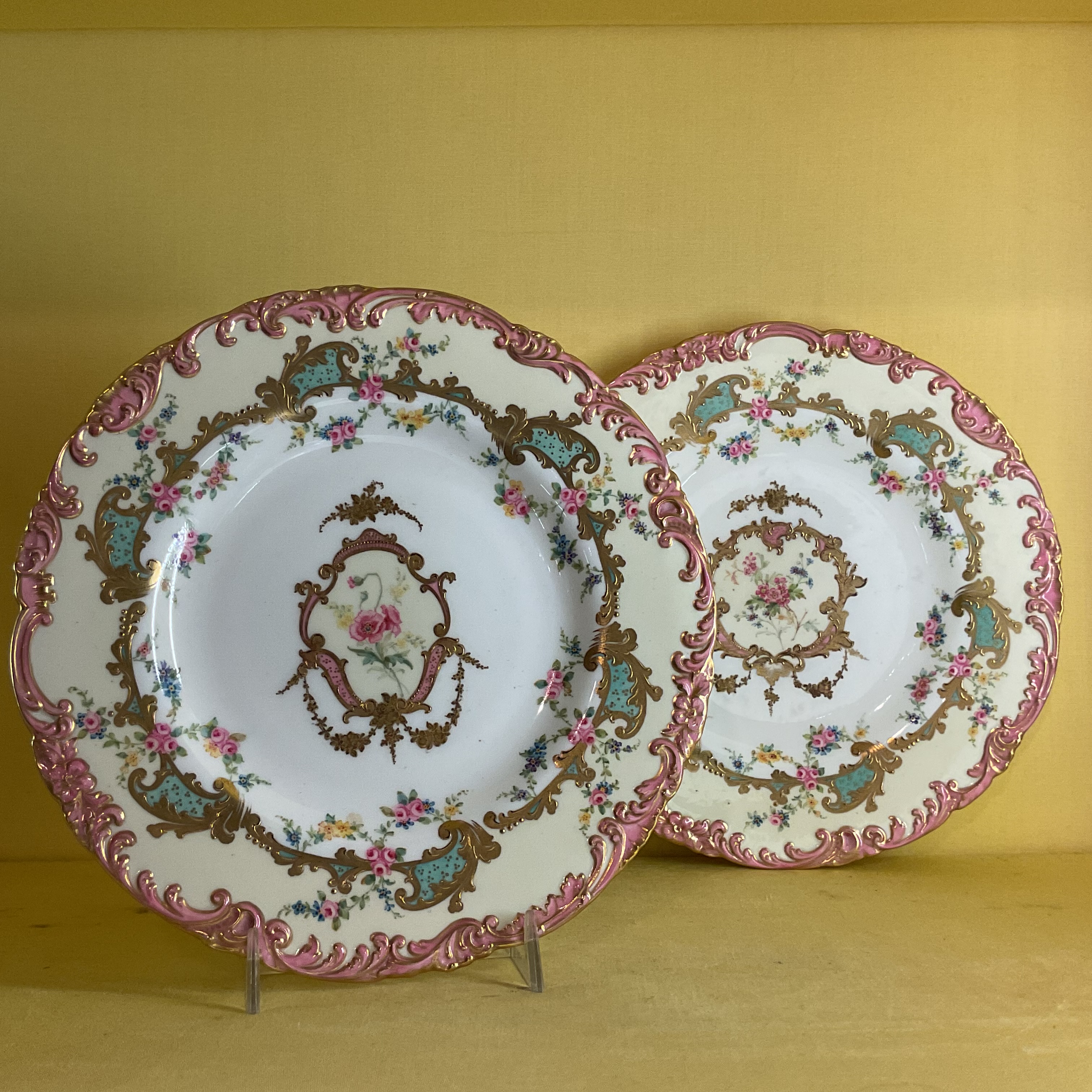 A pair of Royal Crown Derby plates 
