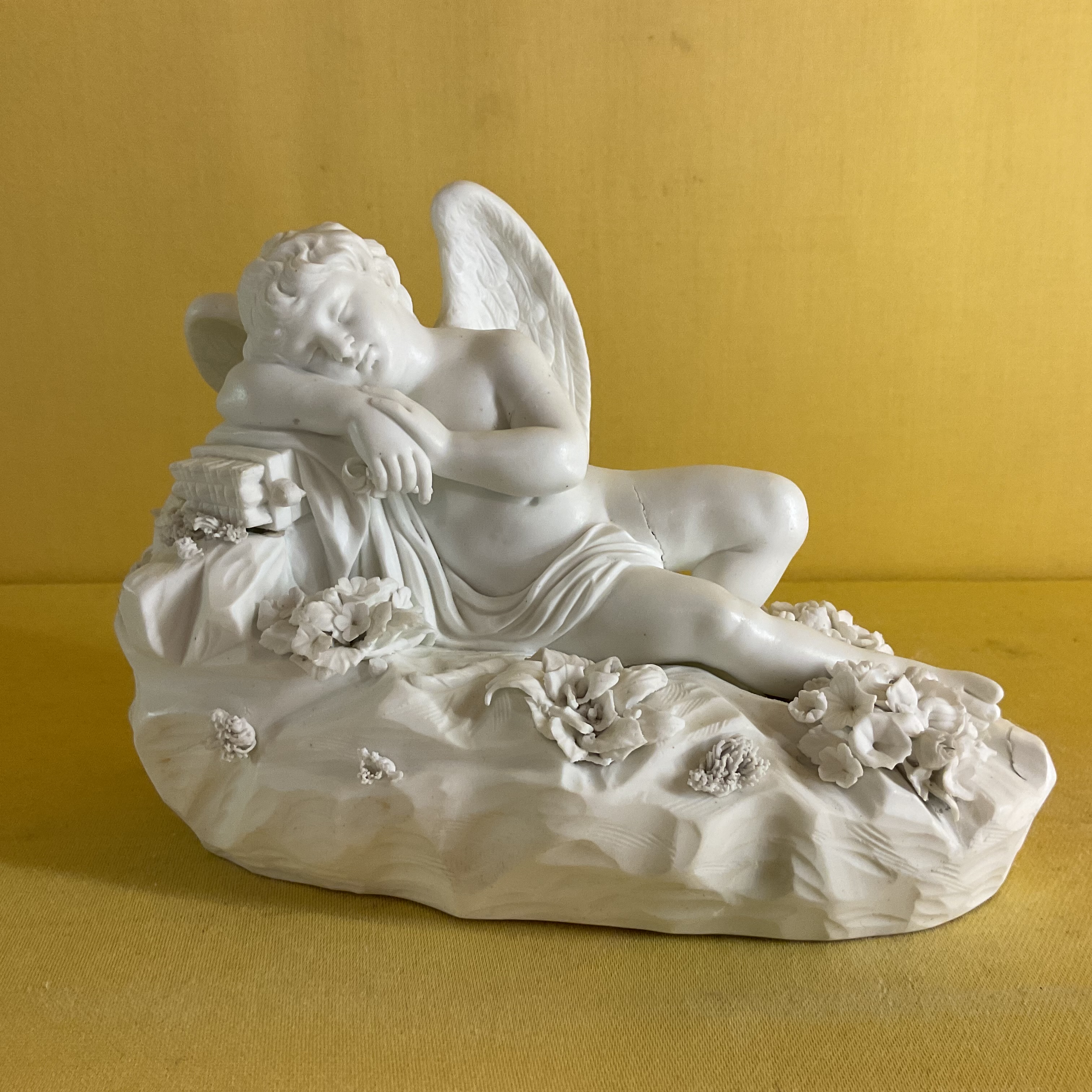 A Derby biscuit porcelain figure 