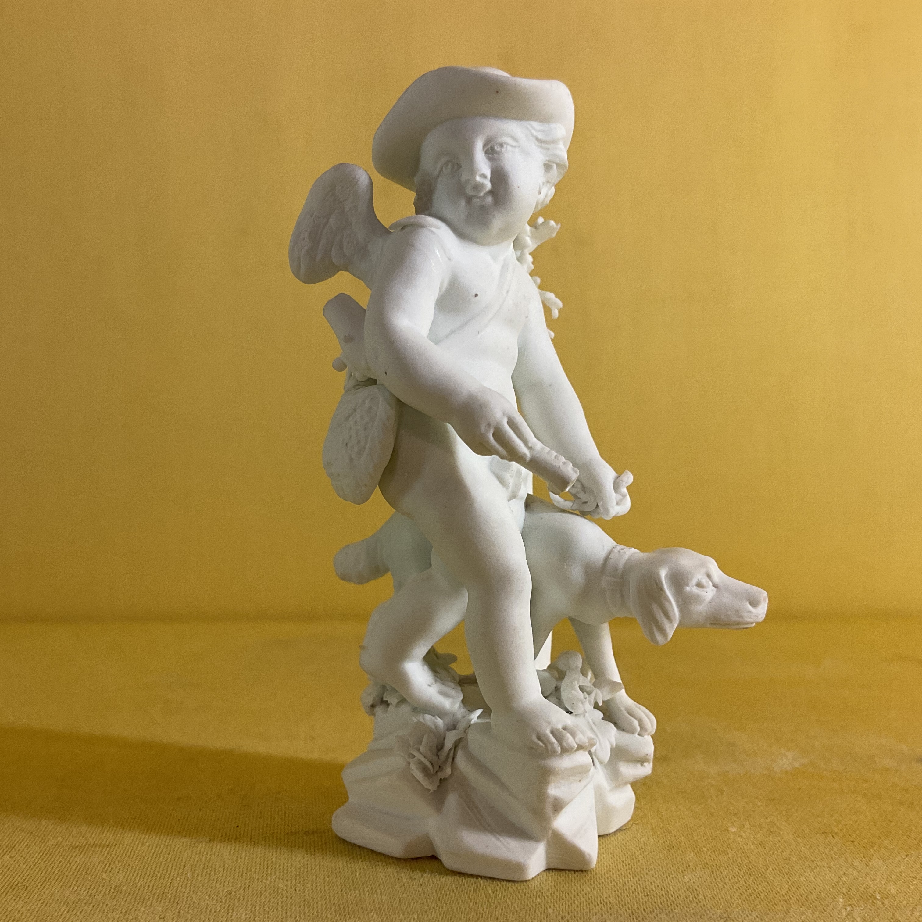 A Derby biscuit porcelain small figure 