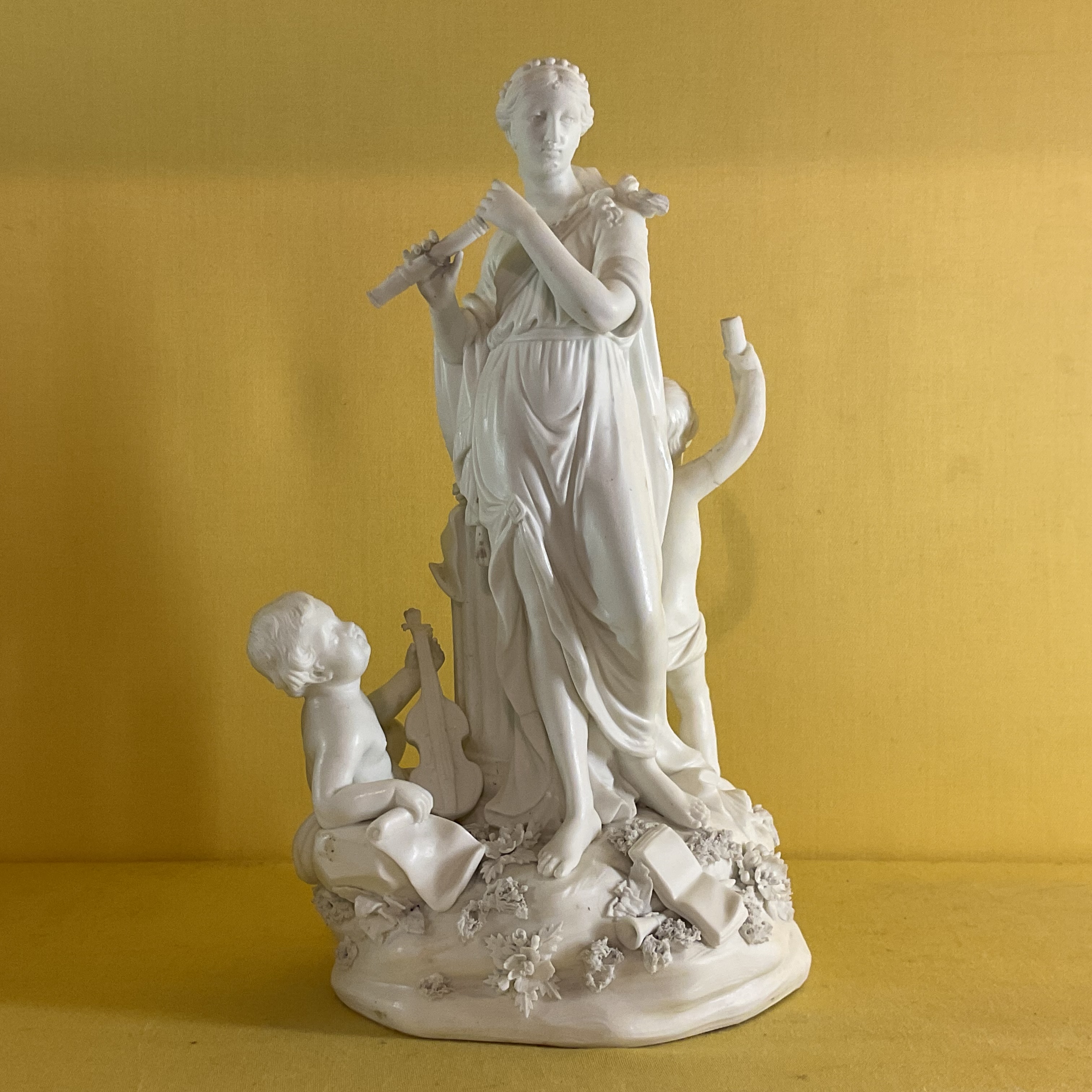 A Derby biscuit porcelain group