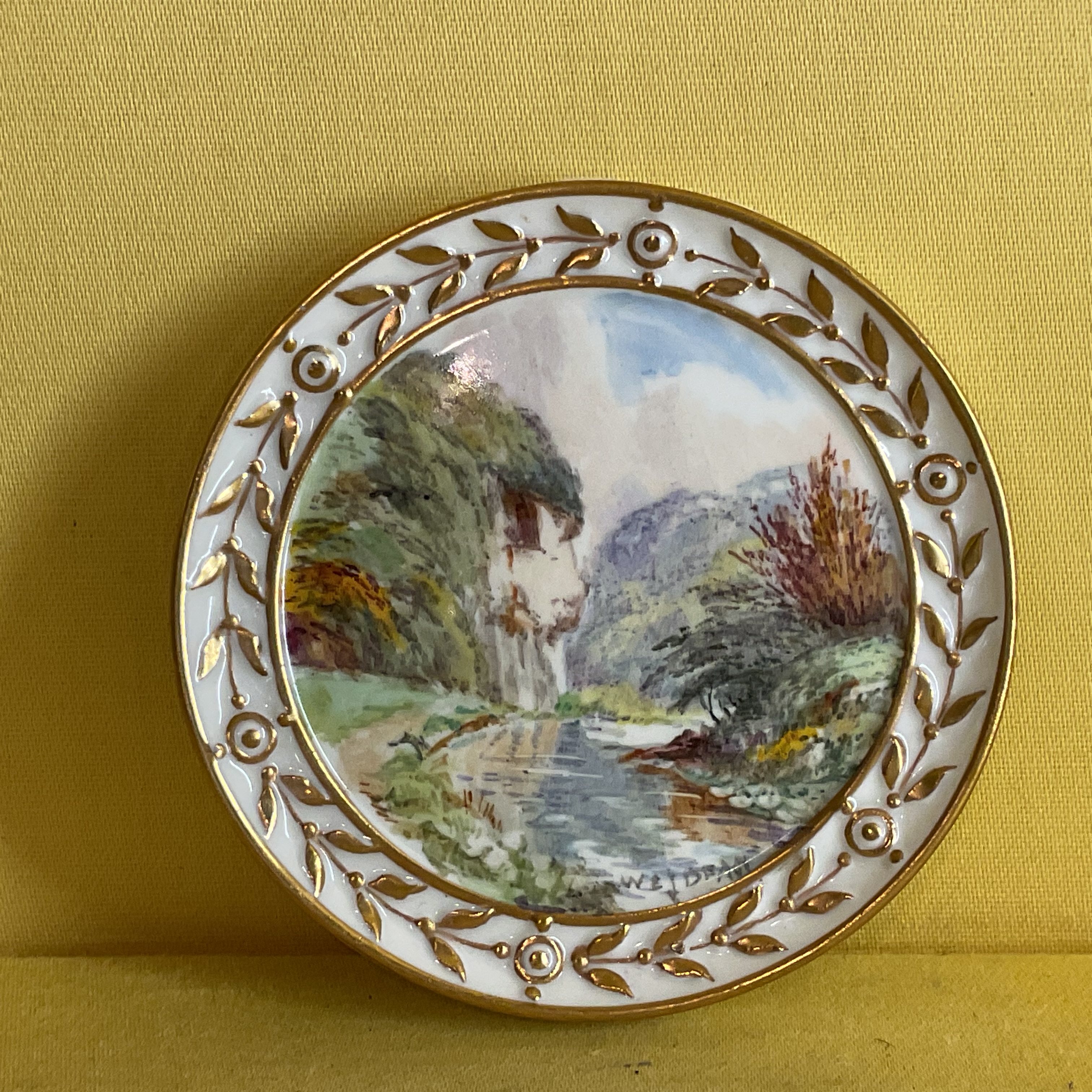 An unusual set of four Royal Crown Derby small plaques 