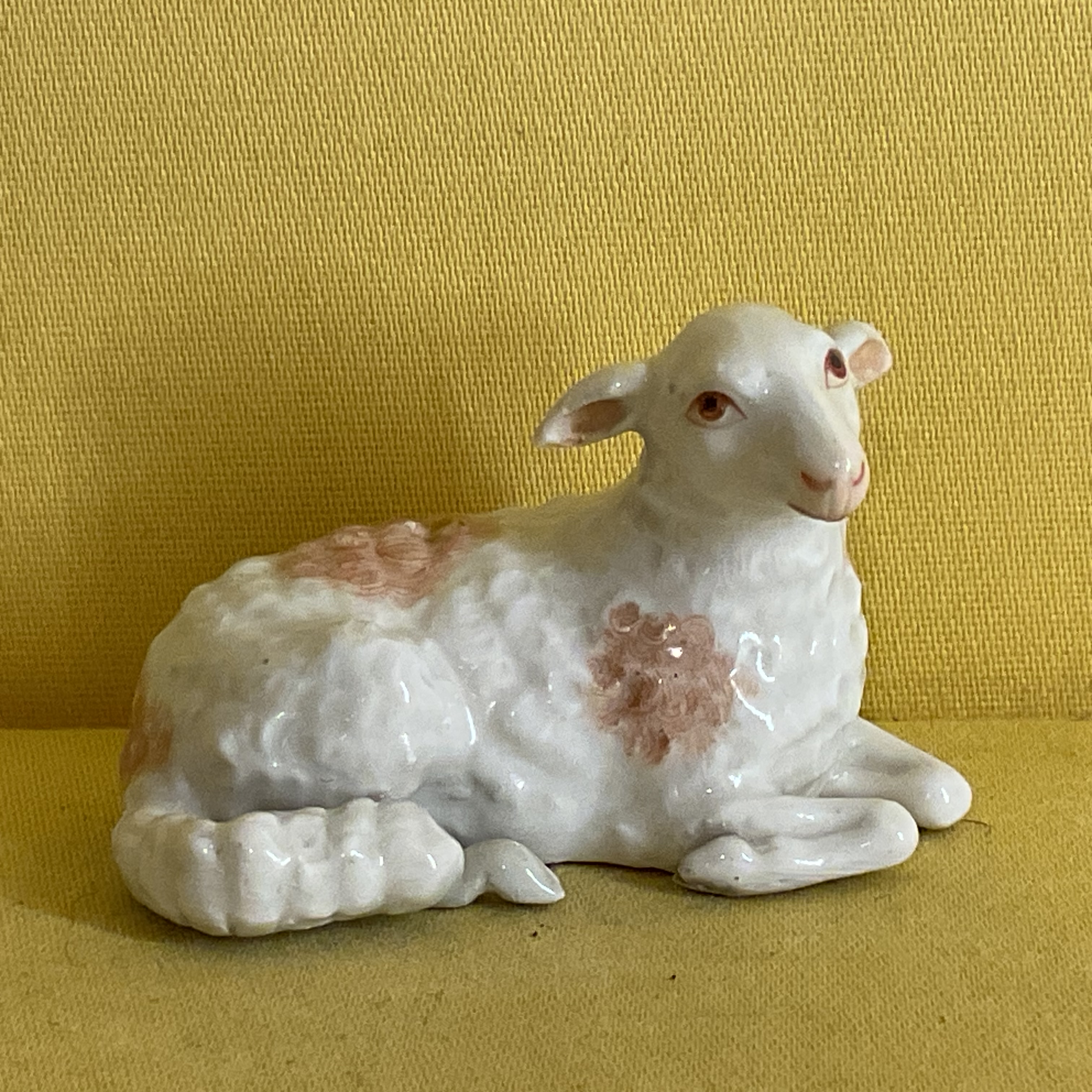 A Meissen miniature model of a recumbent sheep