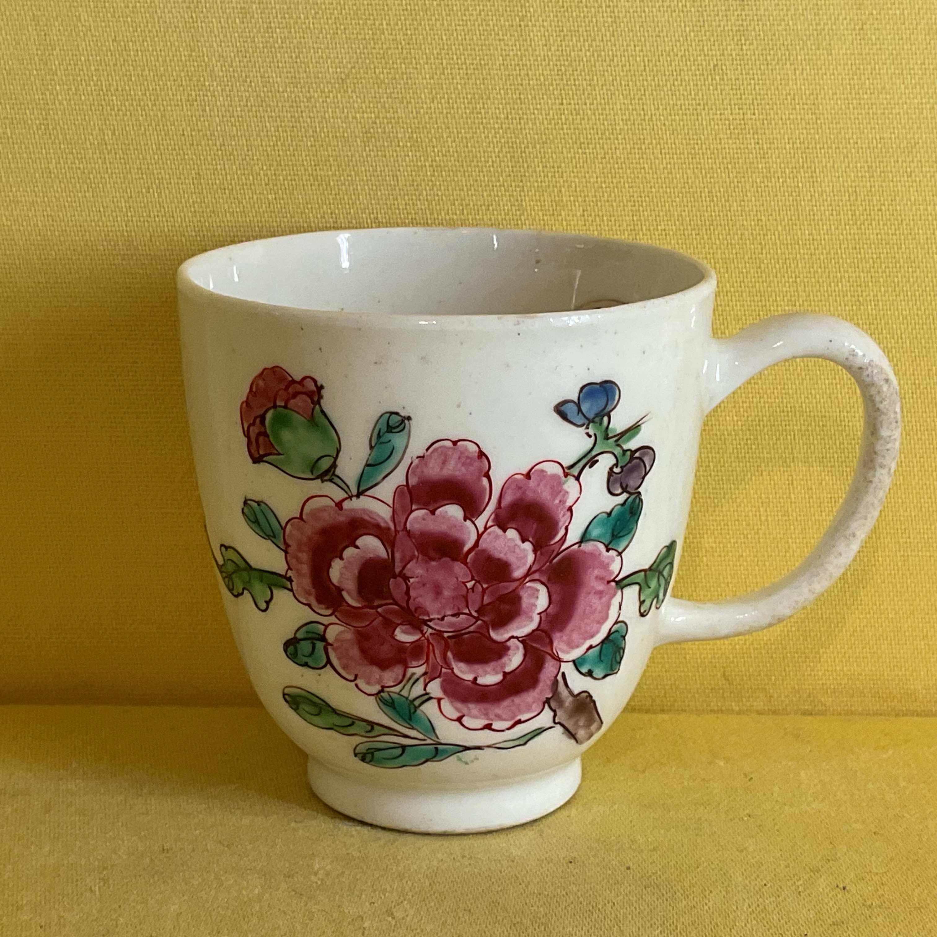 A Bow coffee cup