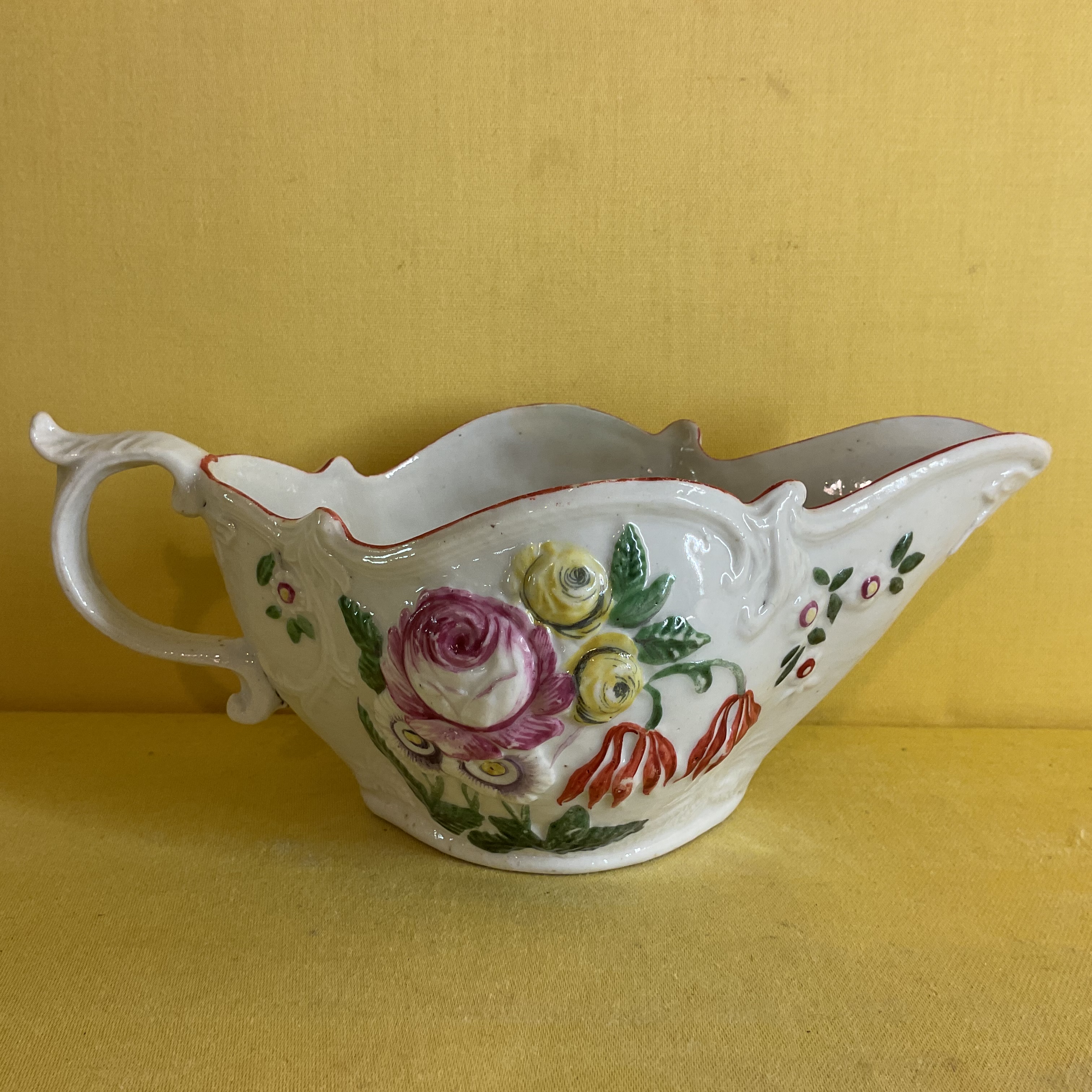 A Bristol oval sauceboat 