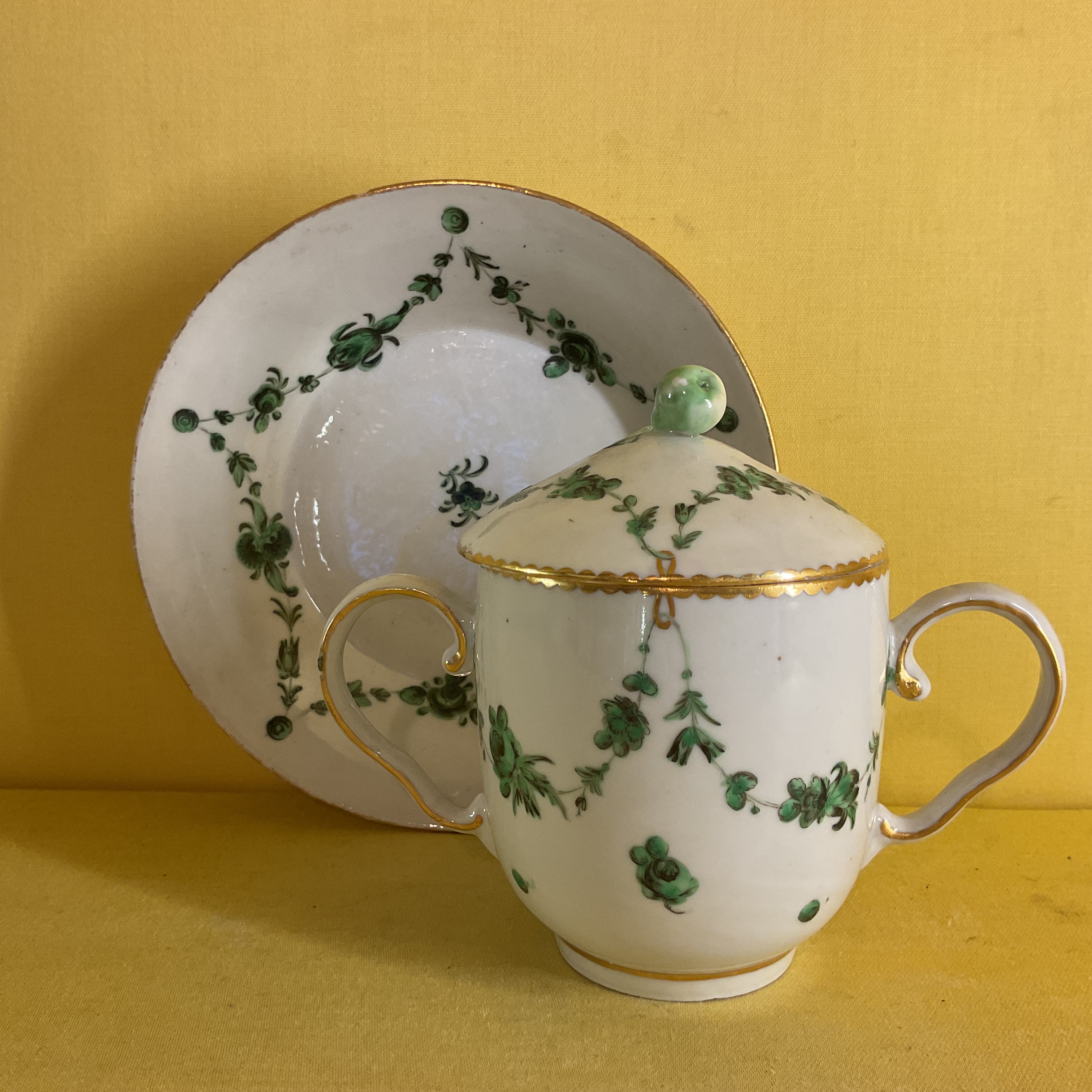 A Bristol chocolate cup, cover and a stand 