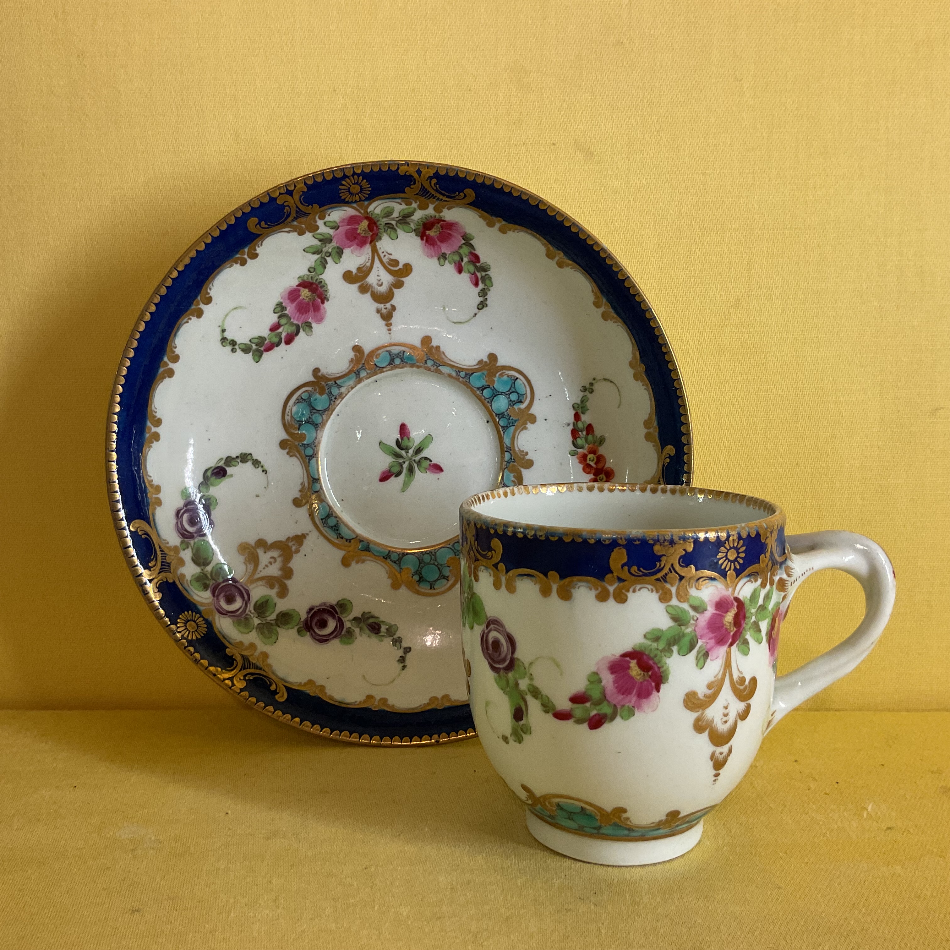 A Worcester coffee cup and trembleuse saucer 