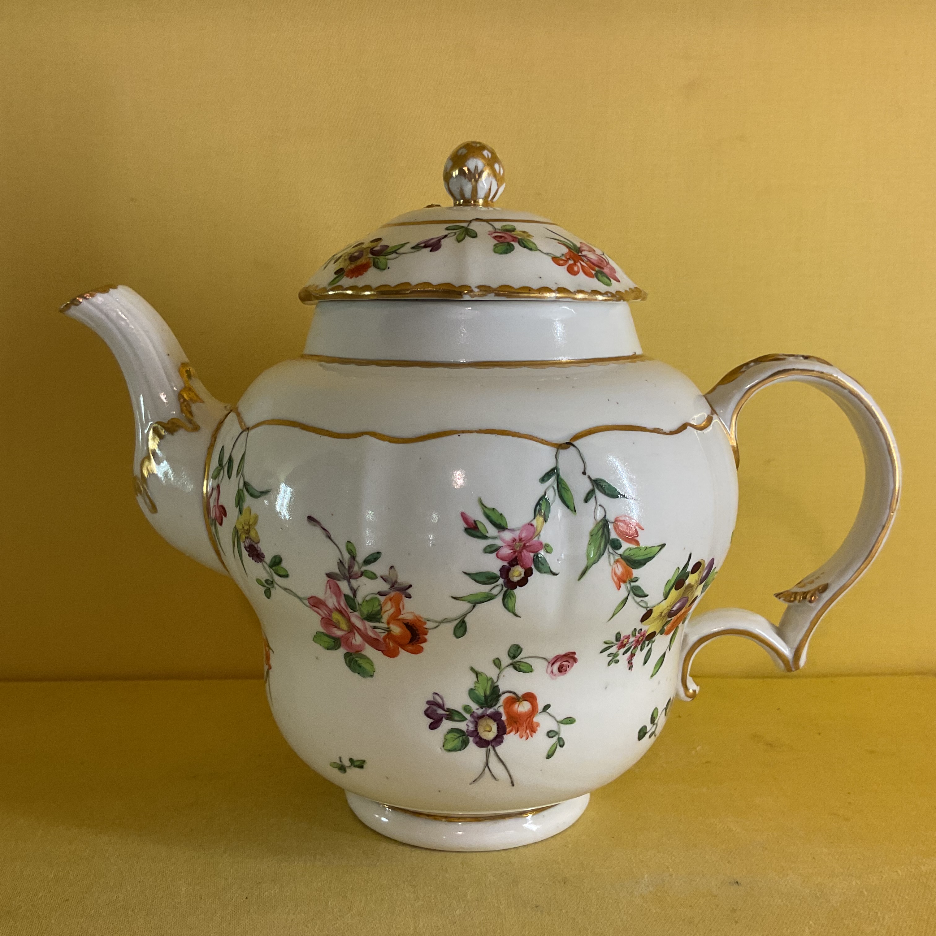 A Bristol ogee shapes teapot and cover
