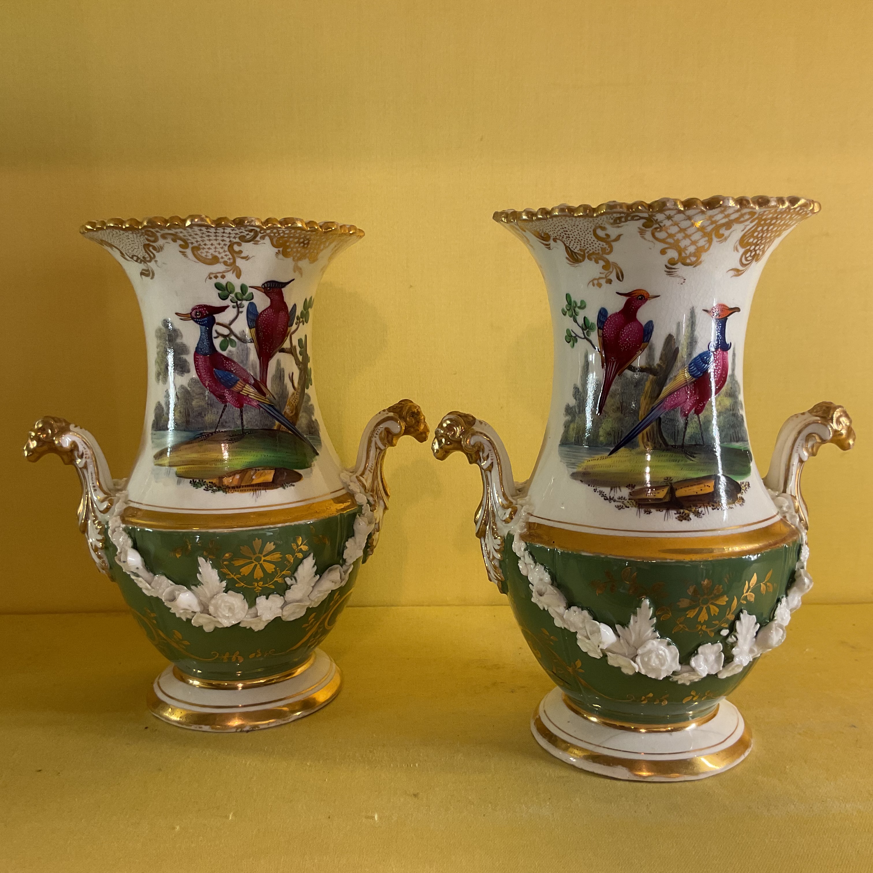 A pair of Coalport baluster shaped vases 