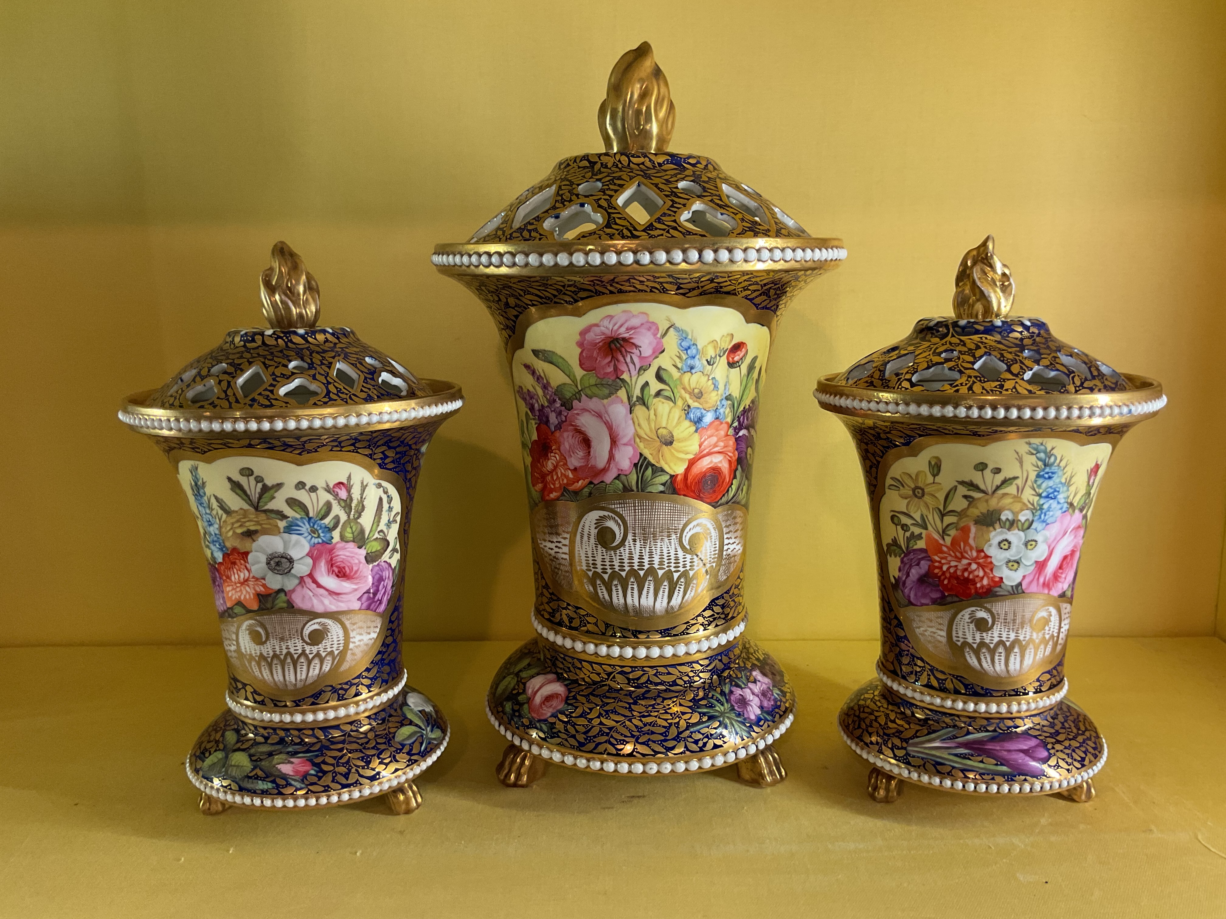 A Spode garniture of three vases and covers 