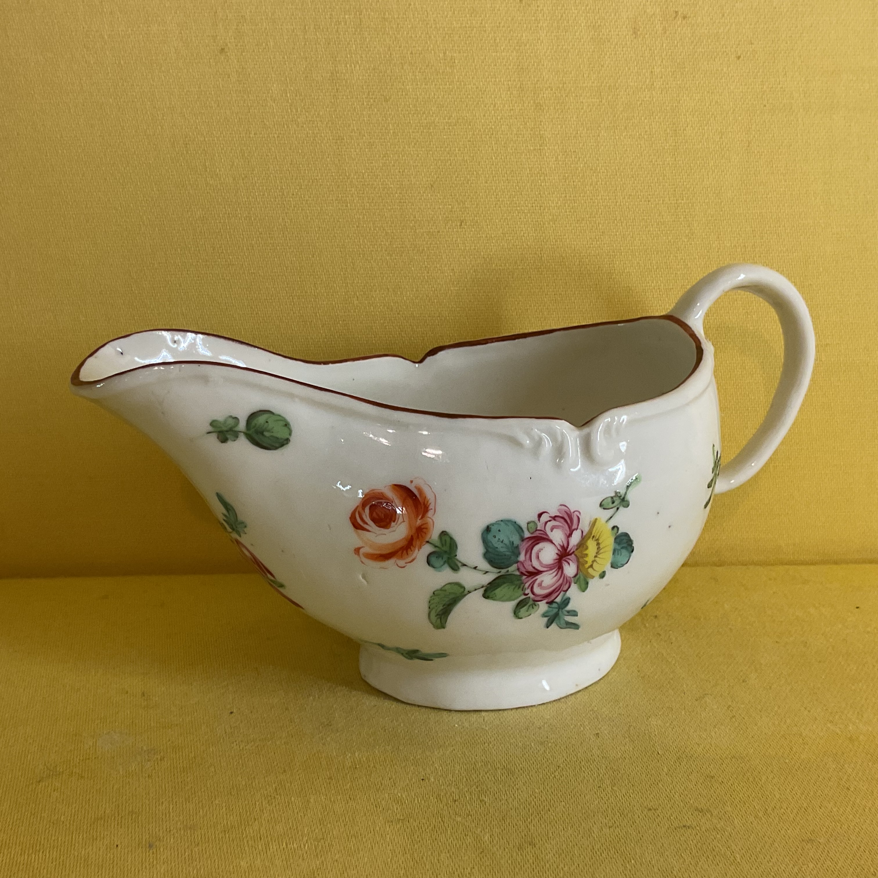 A Bristol small oval sauceboat 