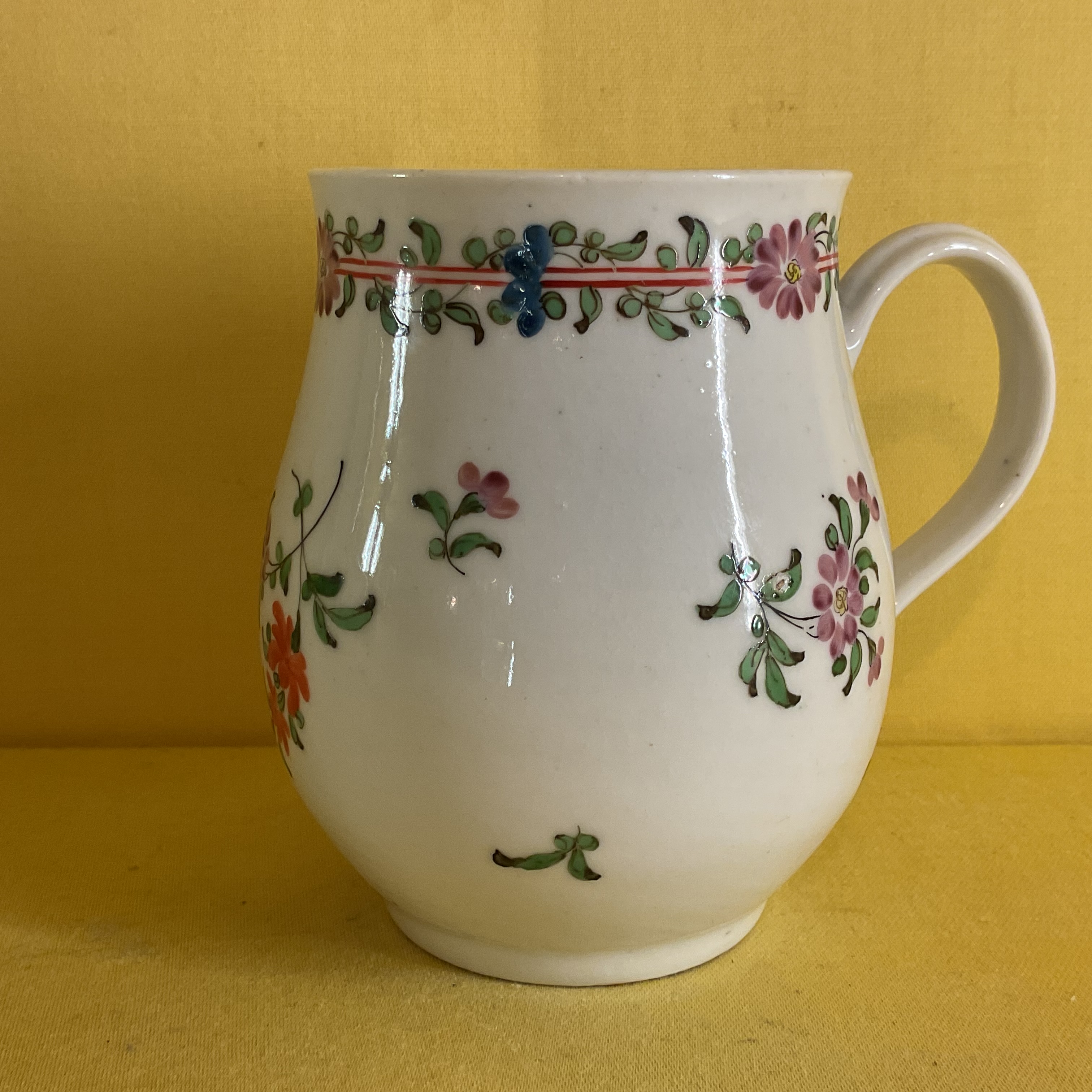 A Bristol baluster shaped small mug 