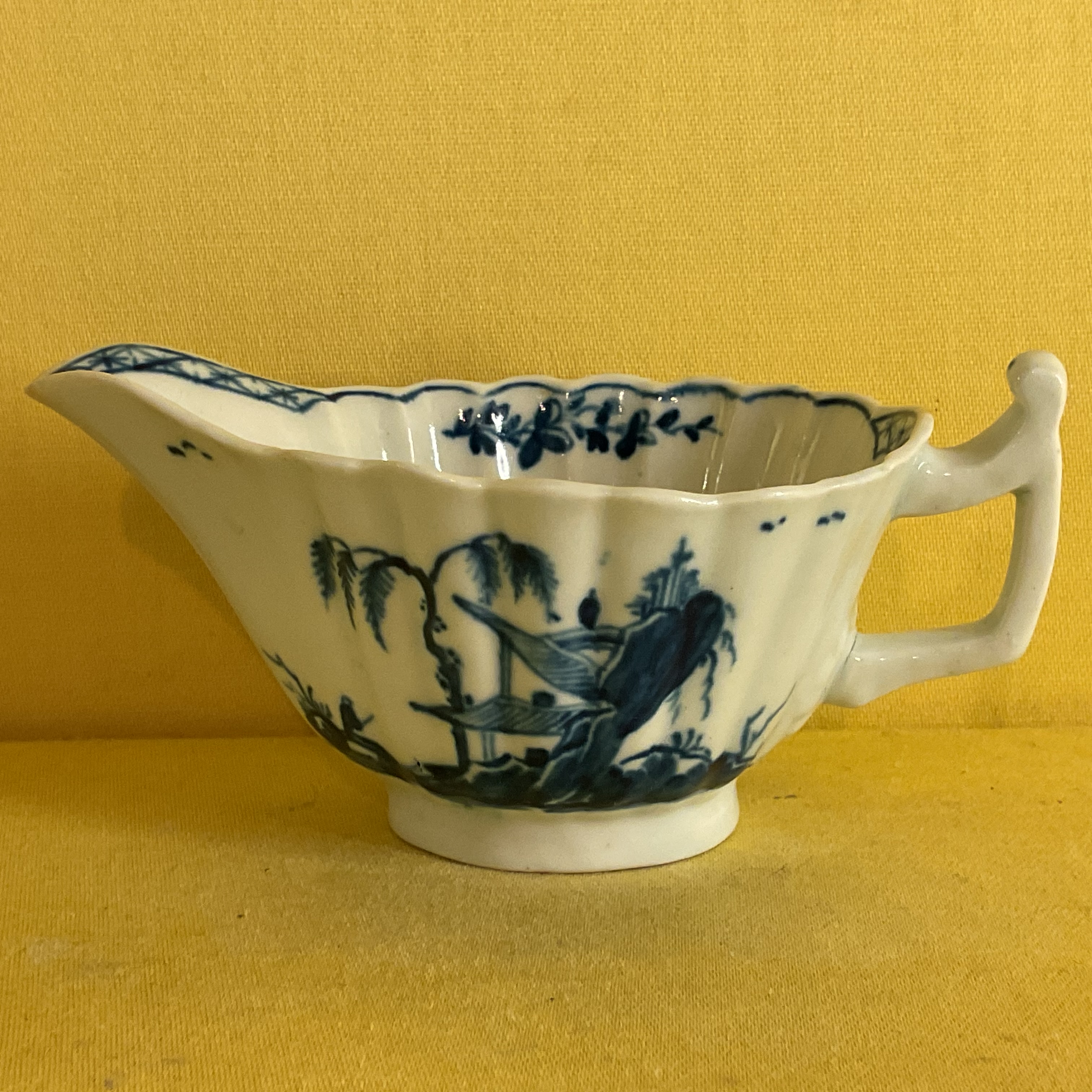 A very rare Worcester small butter boat 