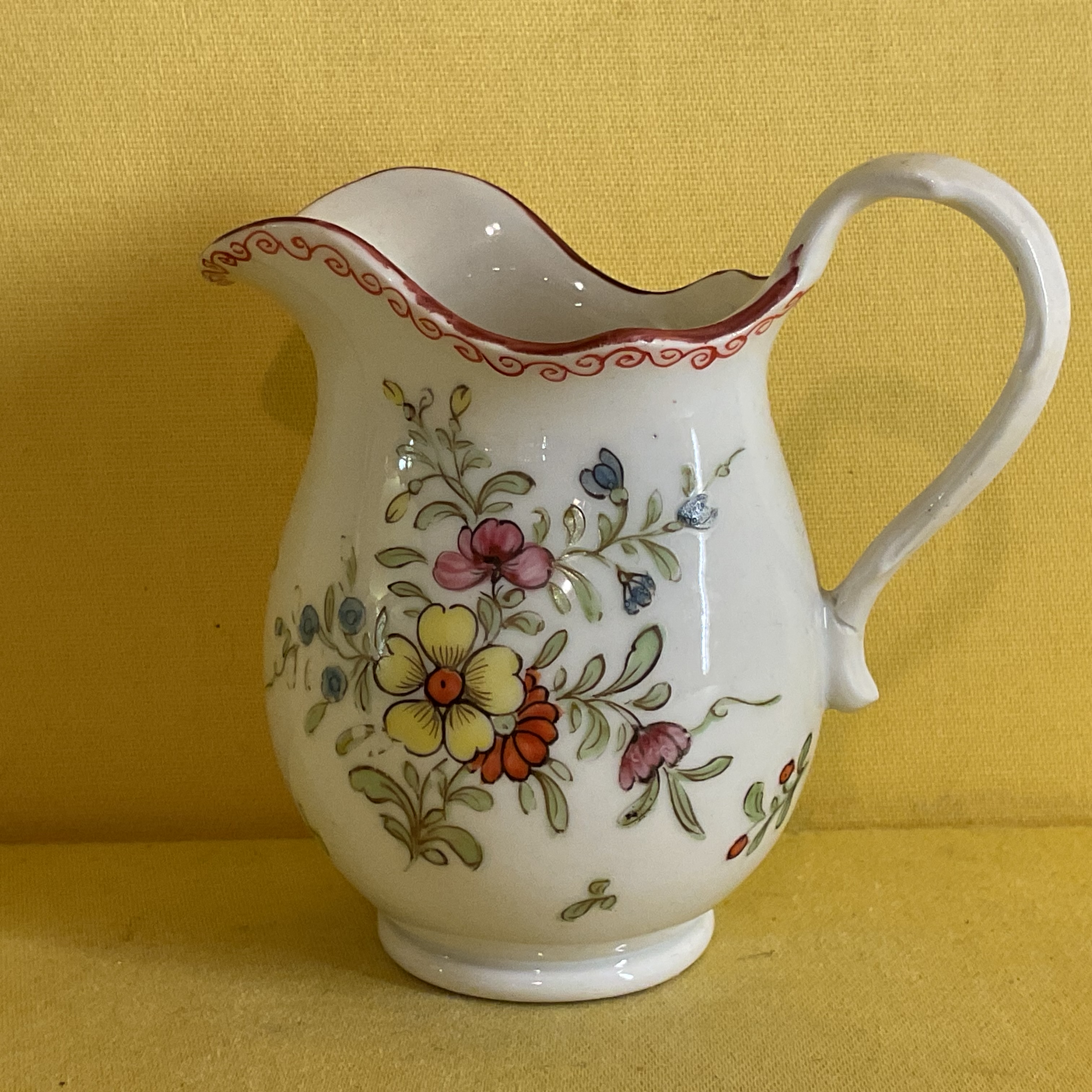 A rare Bristol small baluster shaped cream jug