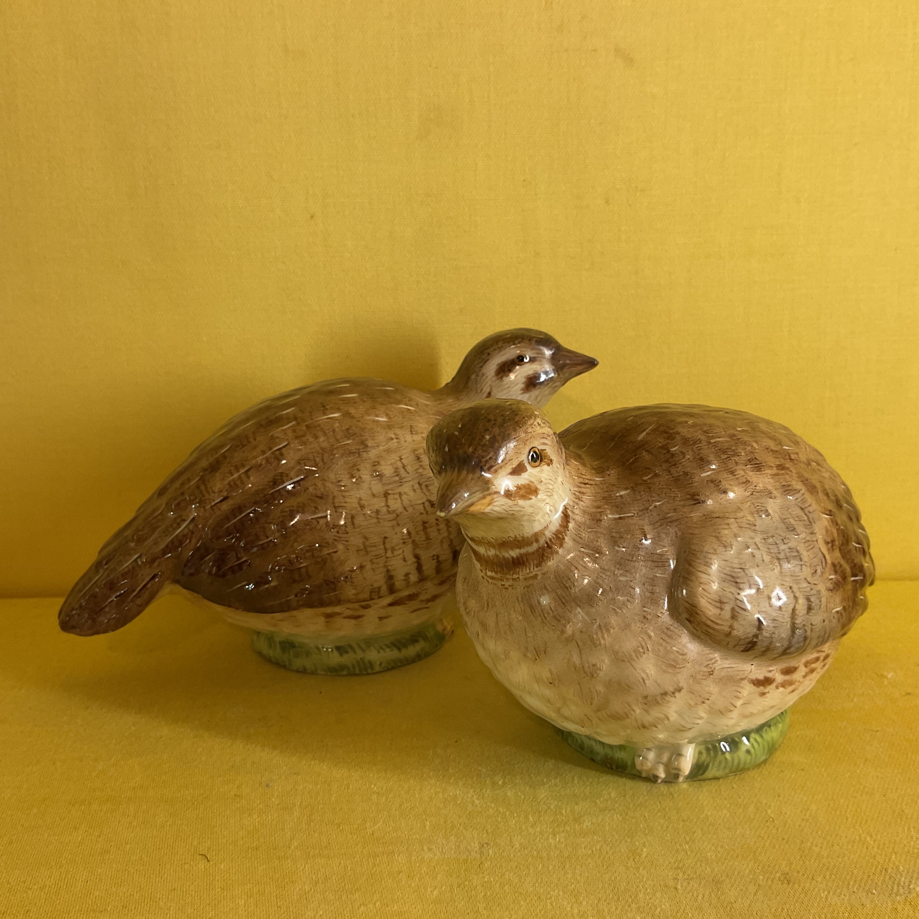 A pair of Meissen models of quail