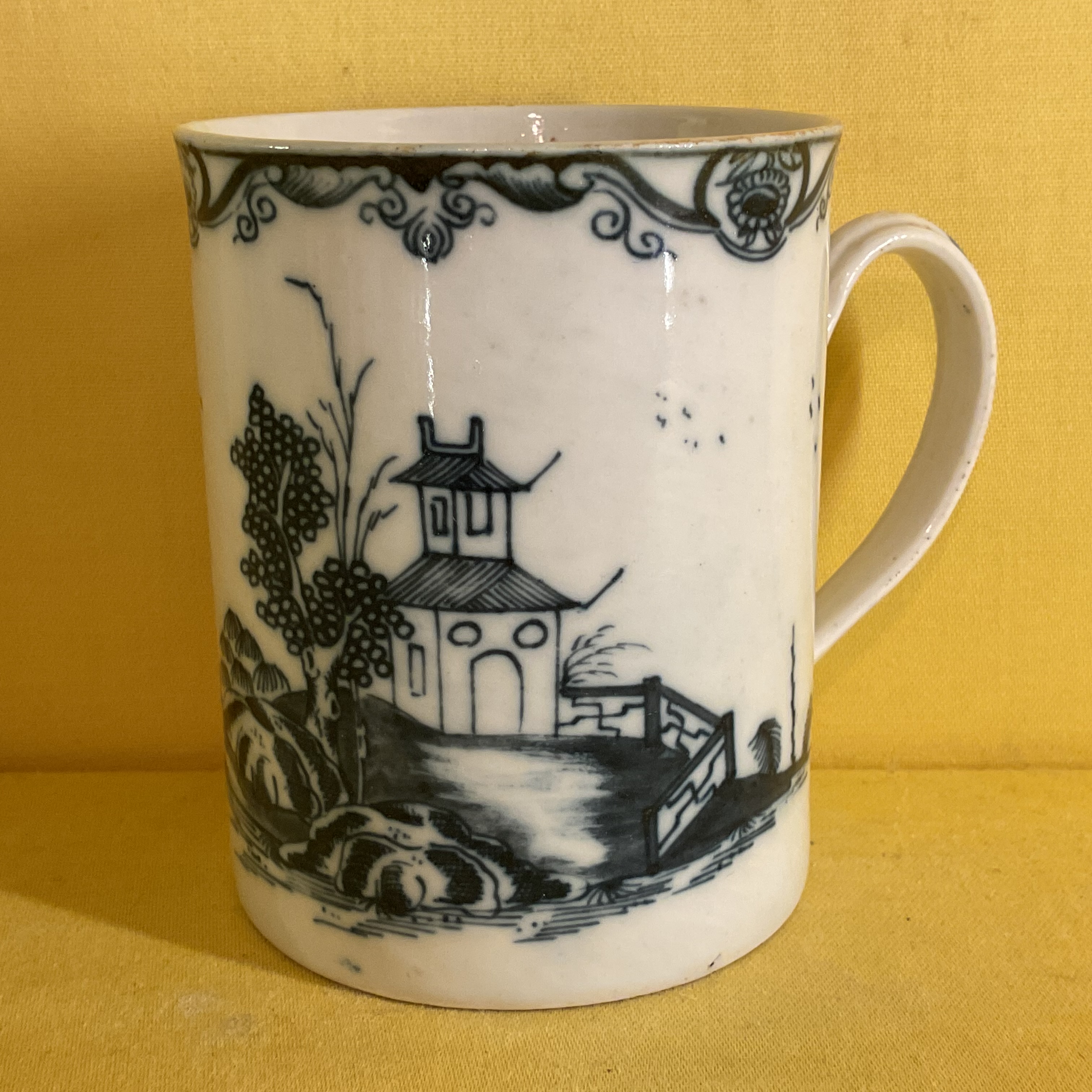 A Plymouth cylindrical mug 