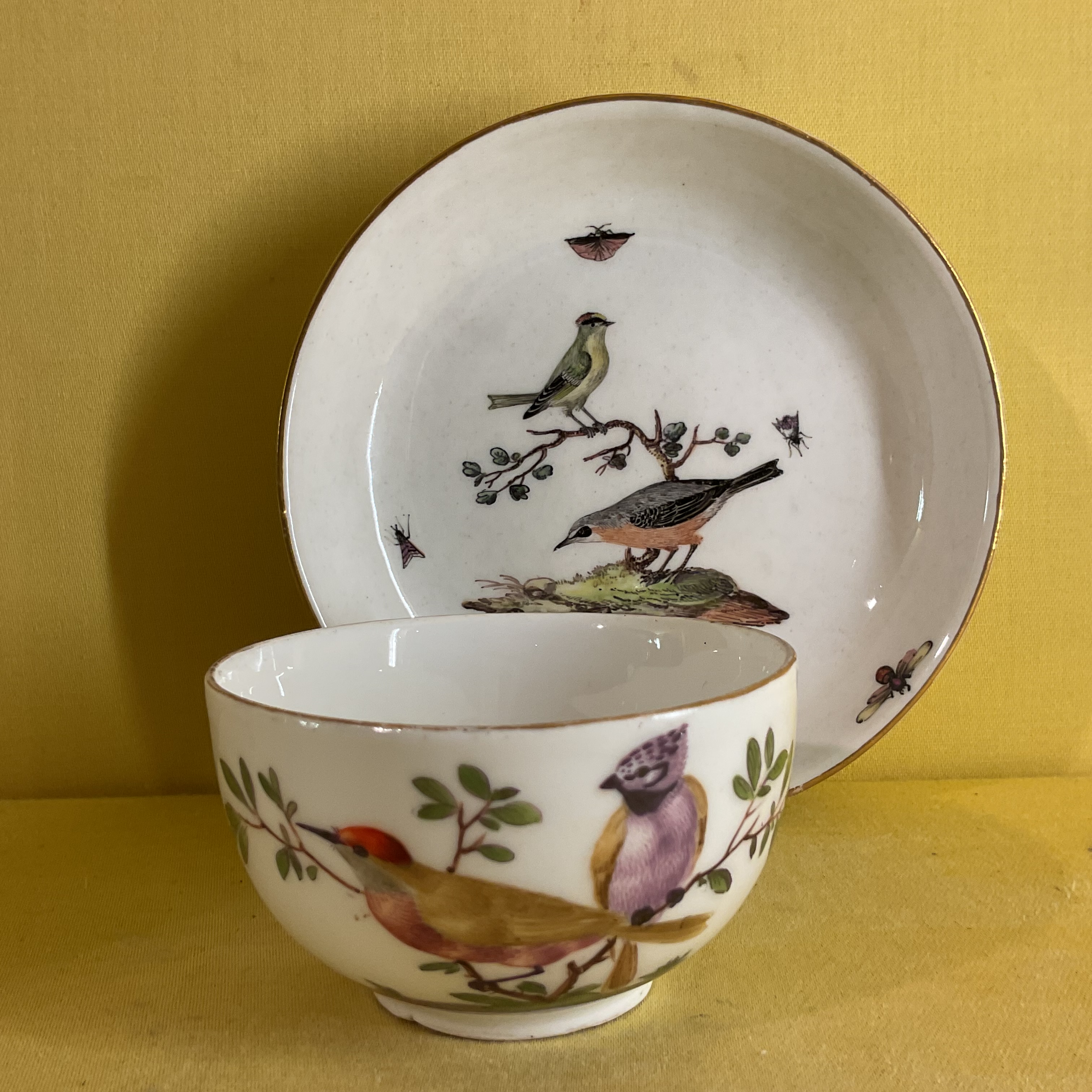 A Meissen teacup and a saucer 